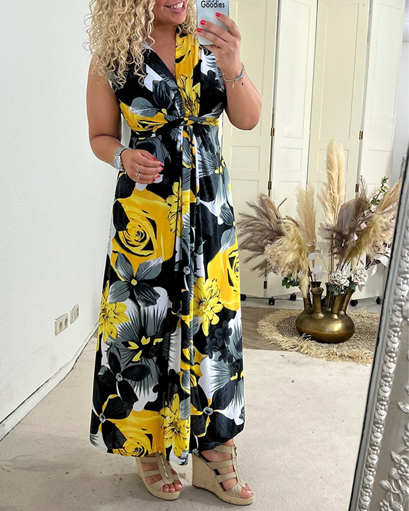 Sacha™ - Elegant sleeveless dress with pleated floral print