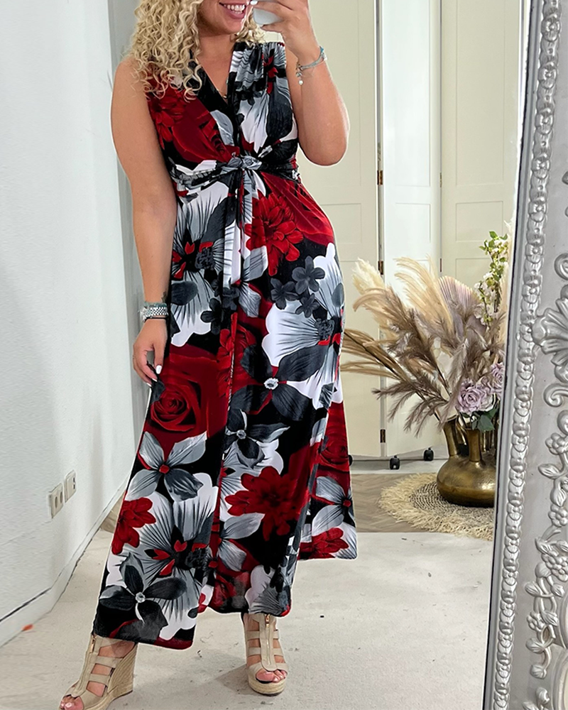 Sacha™ - Elegant sleeveless dress with pleated floral print